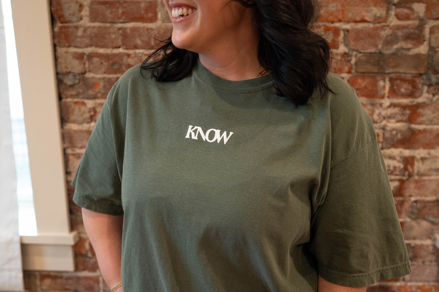 You Are Held in Community- Tee
