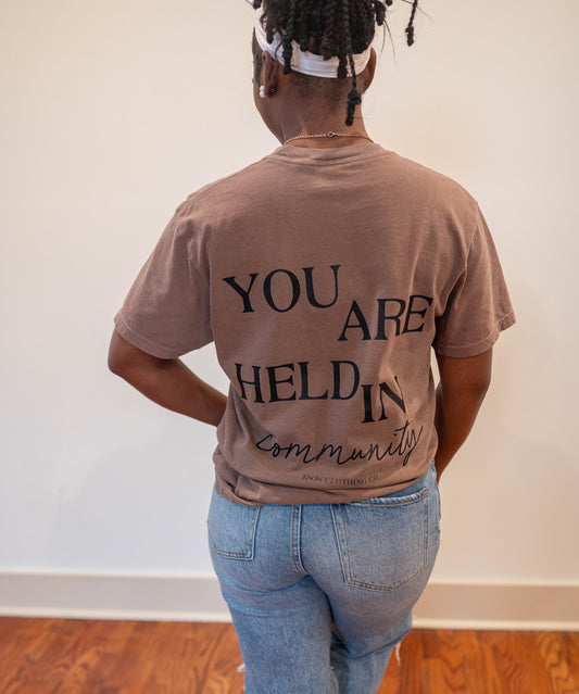 You Are Held in Community- Tee