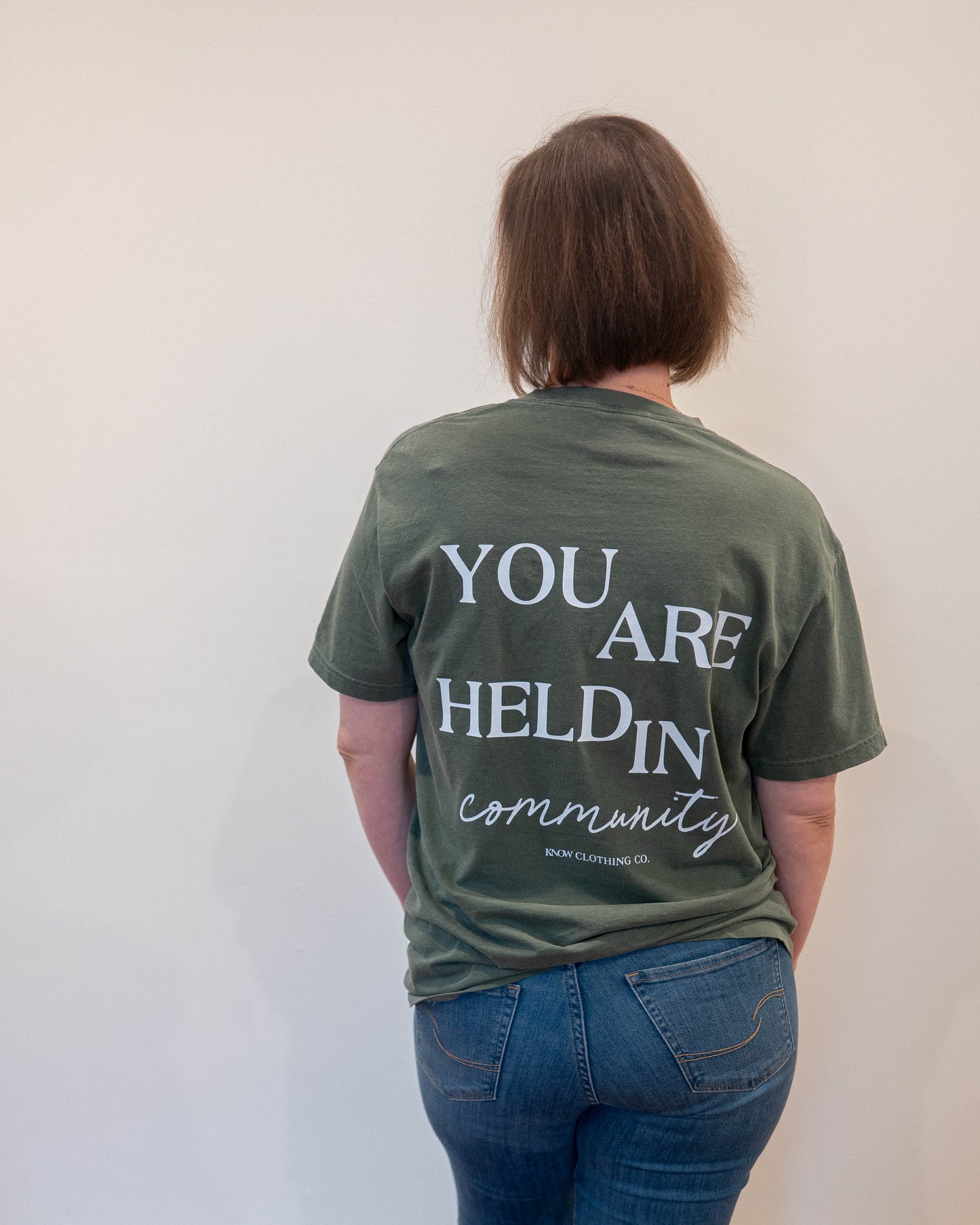 You Are Held in Community- Tee
